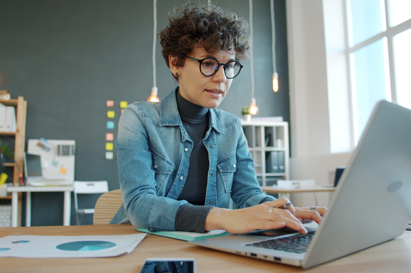 Laptop showing cloud and Microsoft 365 productivity tools