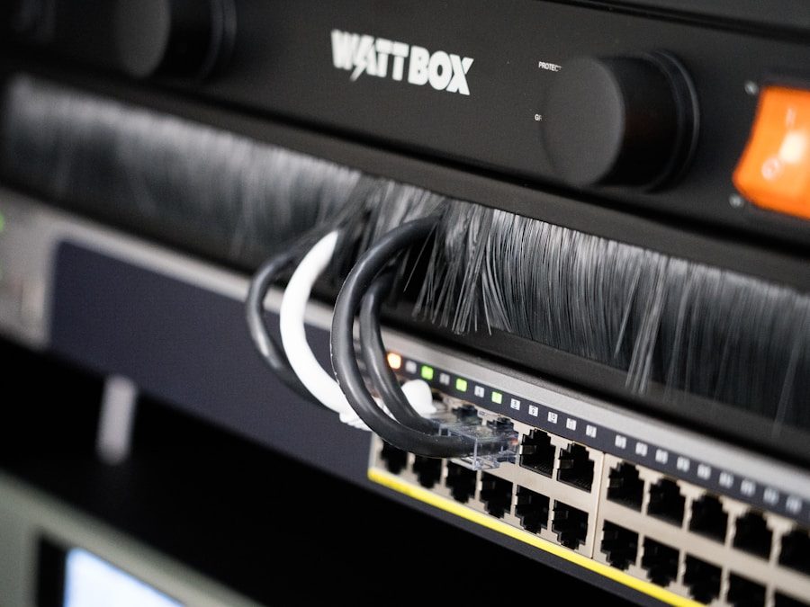 Patch cables plugged into a rack-mounted network switch